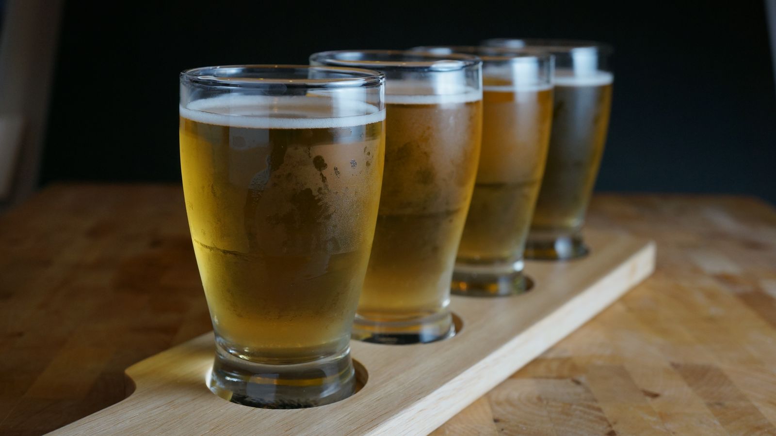 Illustrative stock photo of a flight of craft beers.