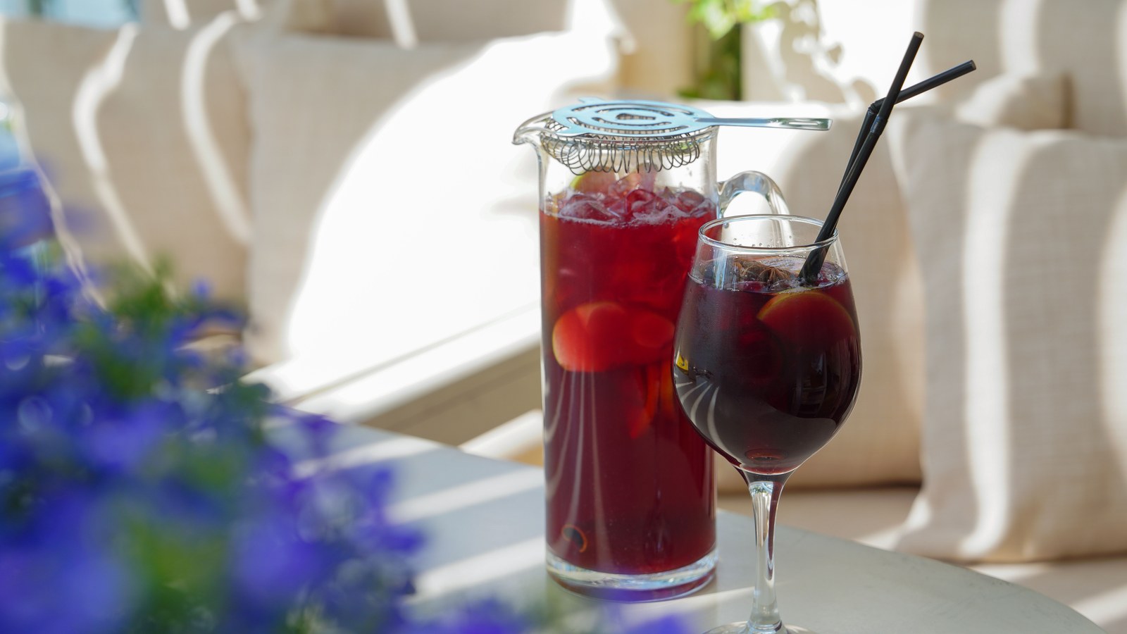 Illustrative stock photo of sangria served on a patio table.
